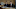 Levi Reed and his lawyer sit at the defendant's table in court Levi Reed and his lawyer sit at the defendant's table in court