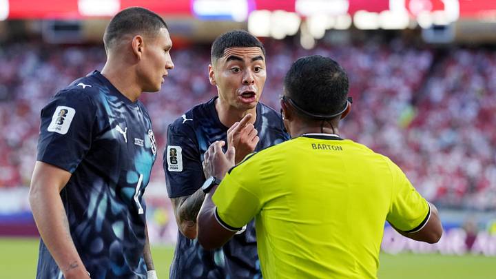 Paraguay's Miguel Almiron argues with referee Ivan Barton