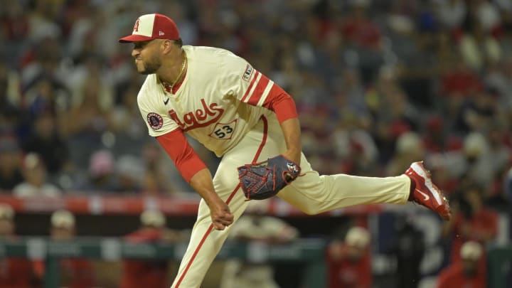 Jul 13, 2024; Anaheim, California, USA;  Carlos Estevez #53 of the Los Angeles Angels earns his 17th save of the season defeating the Seattle Mariners in the ninth inning at Angel Stadium. Mandatory Credit: Jayne Kamin-Oncea-USA TODAY Sports