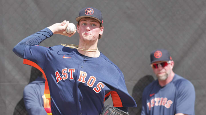Houston Astros starting pitcher Forrest Whitley (60) throws