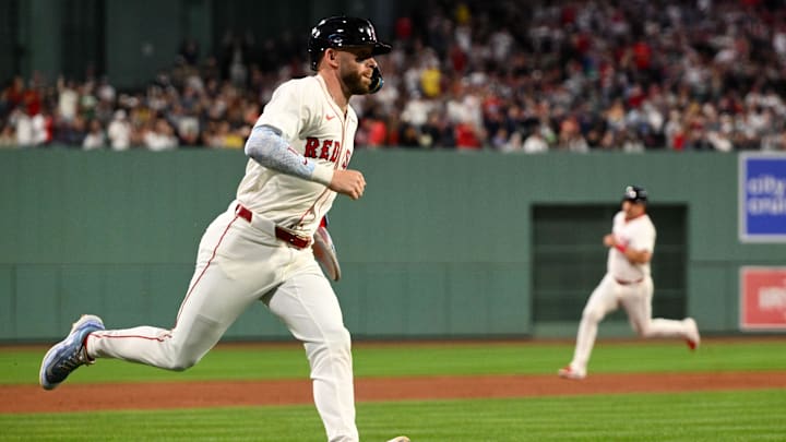 Sep 14, 2025; Boston, Massachusetts, USA;  Boston Red Sox shortstop Trevor Story (10) runs for home after a RBI hit by first baseman Romy Gonzalez (not seen) against the New York Yankees during the first inning at Fenway Park. Mandatory Credit: Brian Fluharty-Imagn Images