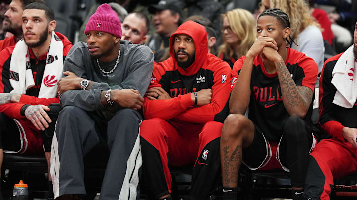 Jan 31, 2025; Toronto, Ontario, CAN: Chicago Bulls guard Jevon Carter (5) (centre) sits on the bench watching the action against the Toronto Raptors the fourth quarter at Scotiabank Arena. Mandatory Credit: Nick Turchiaro-Imagn Images