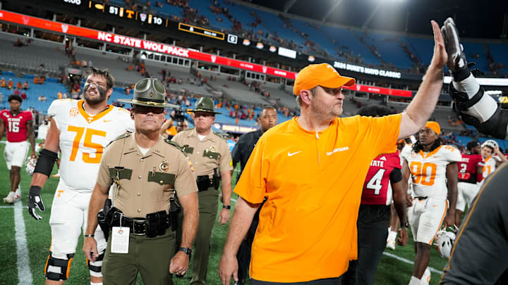 Tennessee head coach Josh Heupel slaps hands with Tennessee offensive lineman Lance Heard (53) after the win over NC State in the Duke's Mayo Classic NCAA College football game on Saturday, Sept. 7, 2024 in Charlotte, NC. Tennessee head coach Josh Heupel slaps hands with Tennessee offensive lineman Lance Heard (53) after the win over NC State in the Duke's Mayo Classic NCAA College football game on Saturday, Sept. 7, 2024 in Charlotte, NC.