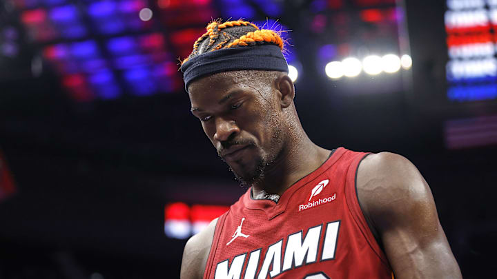 Dec 16, 2024; Detroit, Michigan, USA;  Miami Heat forward Jimmy Butler (22) walks off the court after the game against the Detroit Pistons at Little Caesars Arena. Mandatory Credit: Rick Osentoski-Imagn Images