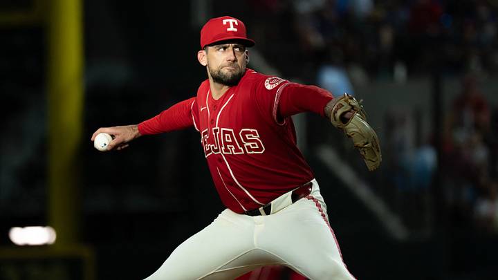 Aug 7, 2026; Arlington, Texas, USA;  Texas Rangers pitcher Nathan Eovaldi (17) throws to the plate against the Baltimore Orioles during the first inning at Globe Life Field. Mandatory Credit: Raymond Carlin III-Imagn Images