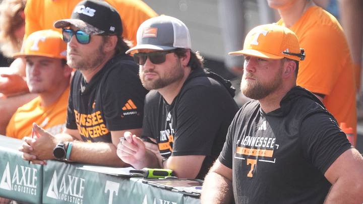 Tennessee baseball coach Josh Elander, right, watches an intrasquad baseball scrimmage with Zach Stovall, center, director of baseball strategy, and pitching coach Austin Knight, left, on Oct. 1, 2026, in Knoxville, Tennessee.