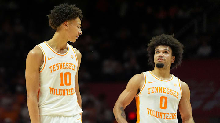 Tennessee forward Nate Ament (10) and guard Ja’Kobi Gillespie (0) 