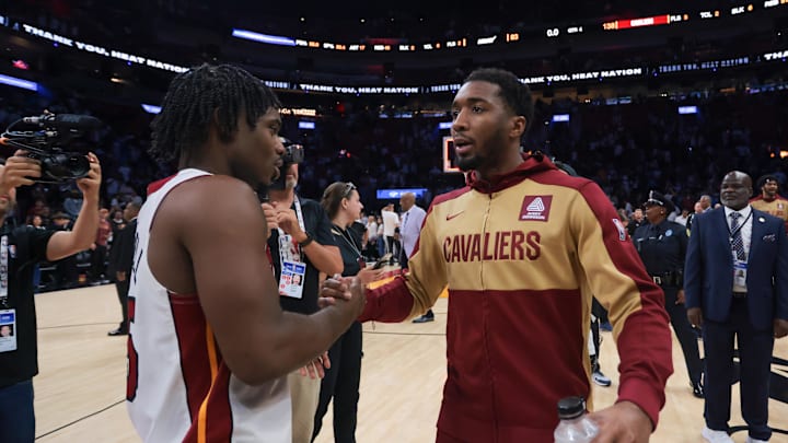 Apr 28, 2025; Miami, Florida, USA; Cleveland Cavaliers guard Donovan Mitchell (45) shakes hands with Miami Heat guard Davion Mitchell (45) after game four for the first round of the 2025 NBA Playoffs at Kaseya Center. Mandatory Credit: Sam Navarro-Imagn Images Apr 28, 2025; Miami, Florida, USA; Cleveland Cavaliers guard Donovan Mitchell (45) shakes hands with Miami Heat guard Davion Mitchell (45) after game four for the first round of the 2025 NBA Playoffs at Kaseya Center. Mandatory Credit: Sam Navarro-Imagn Images