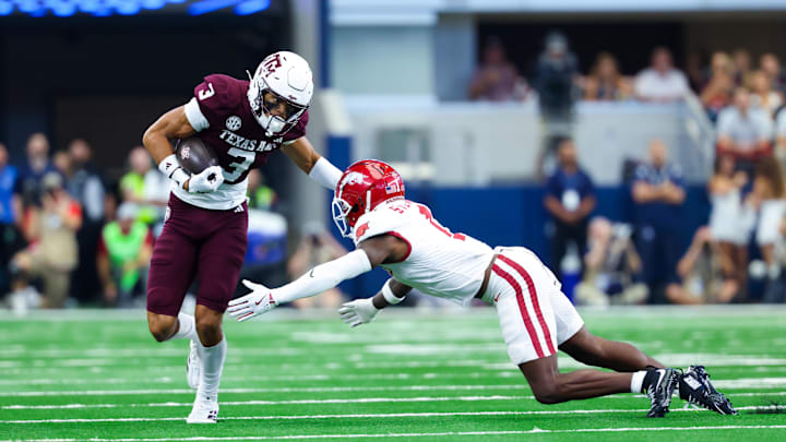 Texas A&M Aggies wide receiver Noah Thomas (3) runs for a touchdown past Arkansas Razorbacks defensive back Kee'yon Stewart (1) during the first quarter at AT&T Stadium. Texas A&M Aggies wide receiver Noah Thomas (3) runs for a touchdown past Arkansas Razorbacks defensive back Kee'yon Stewart (1) during the first quarter at AT&T Stadium.