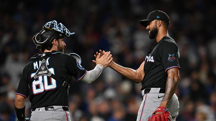 Sep 23, 2026; Chicago, Illinois, USA;  Miami Marlins pitcher Sandy Alcantara (22) celebrates with catcher Joe Mack (80) after defeating the Chicago Cubs after the ninth inning at Wrigley Field.  Mandatory Credit: Patrick Gorski-Imagn Images