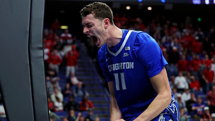 Mar 20, 2025; Lexington, KY, USA; Creighton Bluejays center Ryan Kalkbrenner (11) reacts after a play during the first half against the Louisville Cardinals in the first round of the NCAA Tournament at Rupp Arena. Mandatory Credit: Jordan Prather-Imagn Images