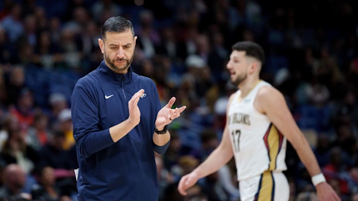 Jan 13, 2026; New Orleans, Louisiana, USA; New Orleans Pelicans head coach James Borrego reacts next New Orleans Pelicans forward Karlo Matkovic (17) during the first half against the Denver Nuggets at Smoothie King Center. Mandatory Credit: Matthew Hinton-Imagn Images