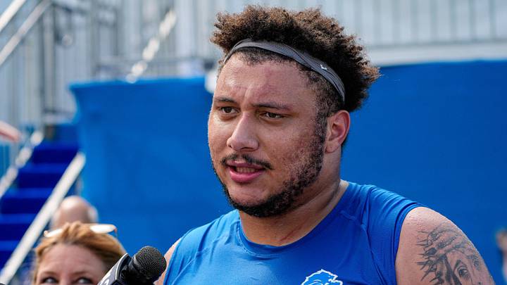 Detroit Lions offensive lineman Christian Mahogany (73) speaks media members after practice during training camp at Meijer Performance Center in Allen Park on Friday, July 31, 2026. Detroit Lions offensive lineman Christian Mahogany (73) speaks media members after practice during training camp at Meijer Performance Center in Allen Park on Friday, July 31, 2026.