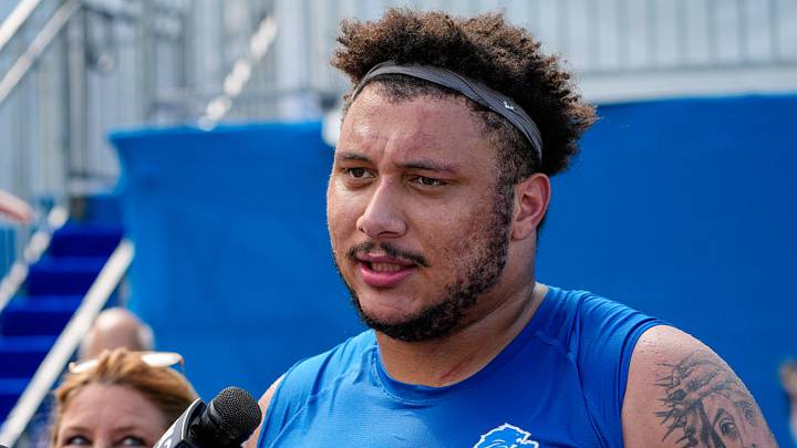 Detroit Lions offensive lineman Christian Mahogany (73) speaks media members after practice during training camp at Meijer Performance Center in Allen Park on Friday, July 31, 2026. Detroit Lions offensive lineman Christian Mahogany (73) speaks media members after practice during training camp at Meijer Performance Center in Allen Park on Friday, July 31, 2026.