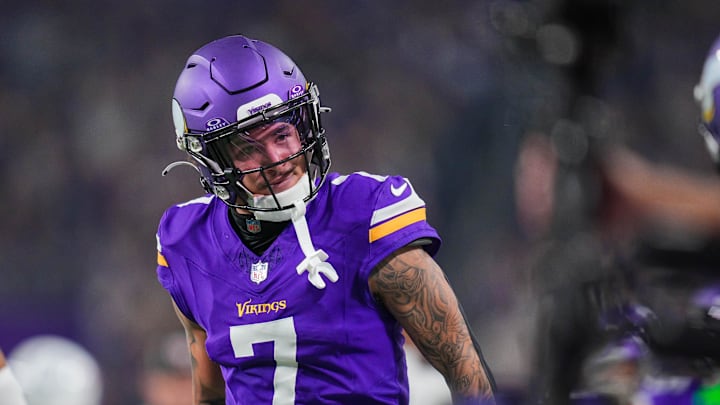 Nov 3, 2024; Minneapolis, Minnesota, USA; Minnesota Vikings cornerback Byron Murphy Jr. (7) celebrates his interception against the Indianapolis Colts in the fourth quarter at U.S. Bank Stadium. Mandatory Credit: Brad Rempel-Imagn Images