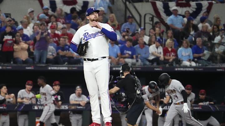 Texas Rangers starting pitcher Jordan Montgomery (52) reacts on the mound after a home run hit by
