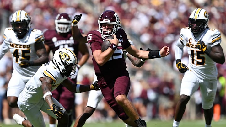 Oct 5, 2024; College Station, Texas, USA; Texas A&M Aggies quarterback Conner Weigman (15) runs the ball in the first half against the Missouri Tigers at Kyle Field. Mandatory Credit: Maria Lysaker-Imagn Images. 