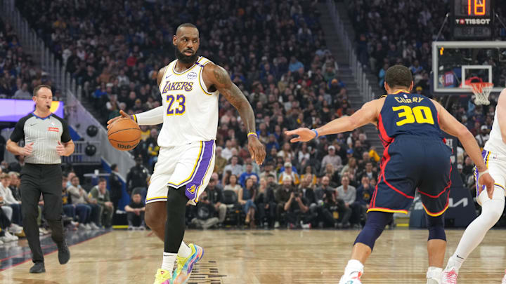 Jan 25, 2025; San Francisco, California, USA; Los Angeles Lakers forward LeBron James (23) dribbles against Golden State Warriors guard Stephen Curry (30) during the first quarter at Chase Center. Mandatory Credit: Darren Yamashita-Imagn Images Jan 25, 2025; San Francisco, California, USA; Los Angeles Lakers forward LeBron James (23) dribbles against Golden State Warriors guard Stephen Curry (30) during the first quarter at Chase Center. Mandatory Credit: Darren Yamashita-Imagn Images