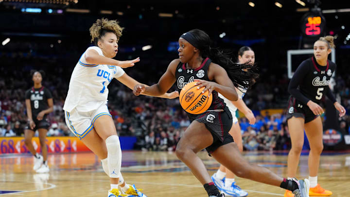 Apr 5, 2026; Phoenix, AZ, USA; South Carolina Gamecocks guard Raven Johnson (25) controls the ball against UCLA Bruins guard Kiki Rice (1) in the second half during the National Championship game of the women's 2026 NCAA Tournament at Mortgage Matchup Center. Mandatory Credit: Kirby Lee-Imagn Images