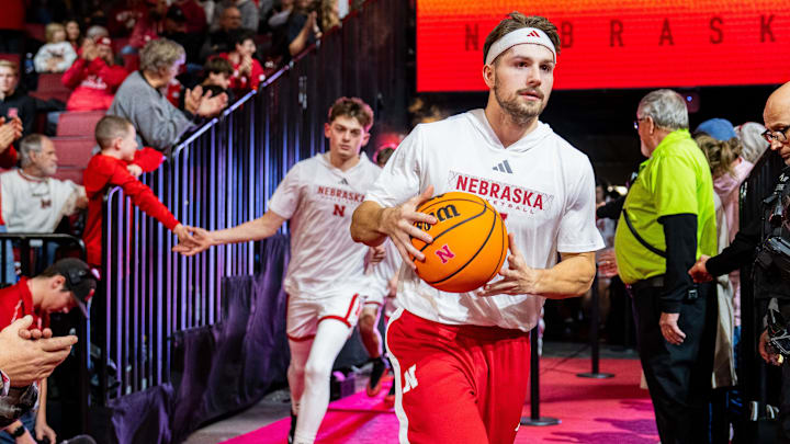 Jan 22, 2025; Lincoln, Nebraska, USA; Nebraska Cornhuskers guard Sam Hoiberg (1) and guard Connor Essegian (0) run onto the court before the game against the Southern California Trojans at Pinnacle Bank Arena. Mandatory Credit: Dylan Widger-Imagn Images
