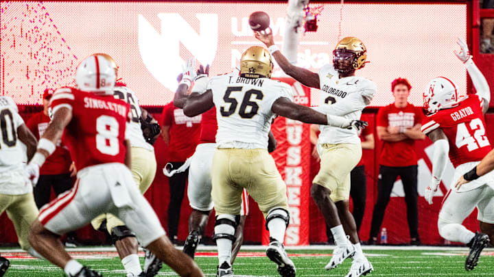 Sep 7, 2024; Lincoln, Nebraska, USA; Colorado Buffaloes quarterback Shedeur Sanders (2) throws away the ball against the Nebraska Cornhuskers during the second quarter at Memorial Stadium. Sep 7, 2024; Lincoln, Nebraska, USA; Colorado Buffaloes quarterback Shedeur Sanders (2) throws away the ball against the Nebraska Cornhuskers during the second quarter at Memorial Stadium.