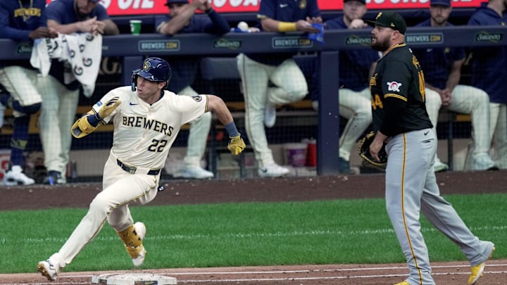 Milwaukee Brewers outfielder Christian Yelich (22) rounds first base after hitting a single during the third inning of their game against the Pittsburgh Pirates Wednesday, July 10, 2024 at American Family Field in Milwaukee, Wisconsin.