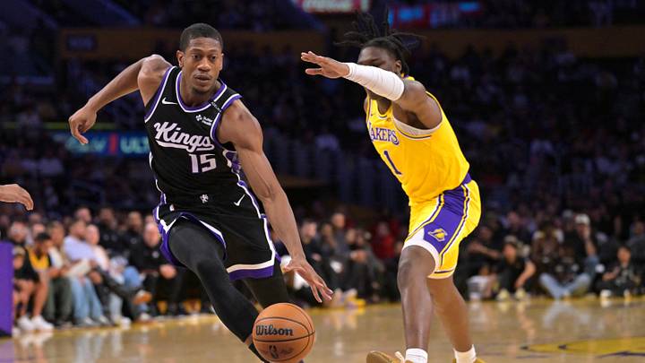 Oct 8, 2026; Los Angeles, California, USA; Sacramento Kings forward De'andre Hunter (15) drives past Los Angeles Lakers forward Adou Thiero (1) in the first half at Crypto.com Arena. Mandatory Credit: Jayne Kamin-Oncea-Imagn Images Oct 8, 2026; Los Angeles, California, USA; Sacramento Kings forward De'andre Hunter (15) drives past Los Angeles Lakers forward Adou Thiero (1) in the first half at Crypto.com Arena. Mandatory Credit: Jayne Kamin-Oncea-Imagn Images