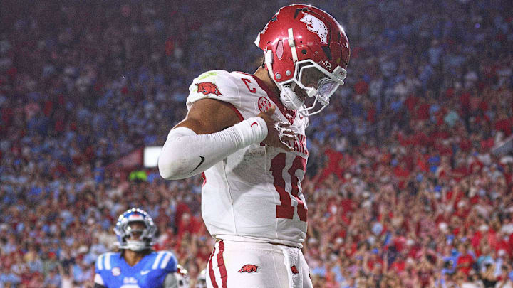 Sep 13, 2025; Oxford, Mississippi, USA; Arkansas Razorback quarterback Taylen Green (10) reacts after running for a touchdown during the second quarter against the Mississippi Rebels at Vaught-Hemingway Stadium. Mandatory Credit: Petre Thomas-Imagn Images