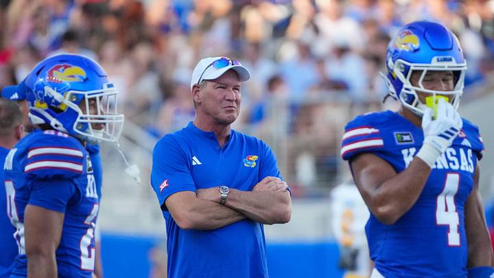 Sep 4, 2026; Lawrence, Kansas, USA; Kansas Jayhawks head coach Lance Leipold watches team warm ups against the LIU Sharks prior to a game at David Booth Kansas Memorial Stadium. Mandatory Credit: Denny Medley-Imagn Images Sep 4, 2026; Lawrence, Kansas, USA; Kansas Jayhawks head coach Lance Leipold watches team warm ups against the LIU Sharks prior to a game at David Booth Kansas Memorial Stadium. Mandatory Credit: Denny Medley-Imagn Images