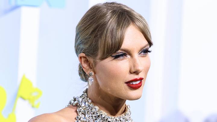 American singer-songwriter and cultural icon Taylor Swift wearing an Oscar de la Renta dress.