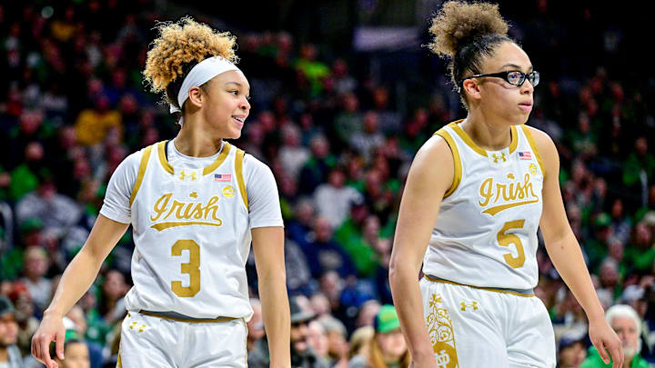 Feb 17, 2025; South Bend, Indiana, USA; Notre Dame Fighting Irish guard Hannah Hidalgo (3) and guard Olivia Miles (5) pause in the first half against the Duke Blue Devils at the Purcell Pavilion. Mandatory Credit: Matt Cashore-Imagn Images Feb 17, 2025; South Bend, Indiana, USA; Notre Dame Fighting Irish guard Hannah Hidalgo (3) and guard Olivia Miles (5) pause in the first half against the Duke Blue Devils at the Purcell Pavilion. Mandatory Credit: Matt Cashore-Imagn Images