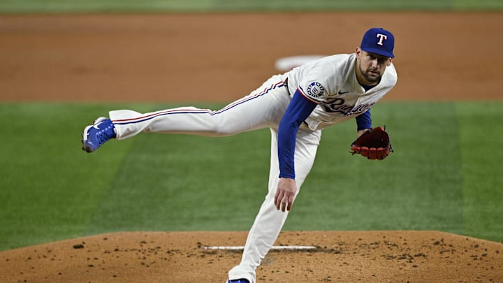 Sep 17, 2024; Arlington, Texas, USA; Texas Rangers starting pitcher Nathan Eovaldi (17) pitches against the Toronto Blue Jays during the first inning at Globe Life Field. Mandatory Credit: Jerome Miron-Imagn Images
