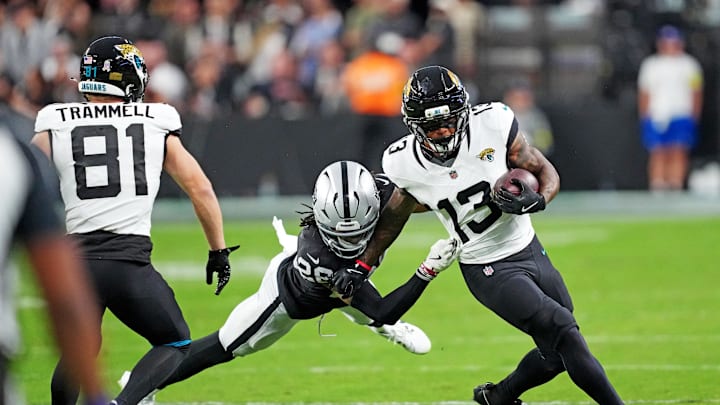 Nov 2, 2025; Paradise, Nevada, USA; Jacksonville Jaguars wide receiver Tim Jones (13) runs the ball during the second half against the Las Vegas Raiders at Allegiant Stadium. Mandatory Credit: Kirby Lee-Imagn Images