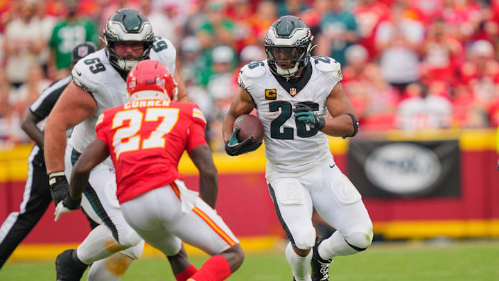 Sep 14, 2025; Kansas City, Missouri, USA; Philadelphia Eagles running back Saquon Barkley (26) carries the ball defended by Kansas City Chiefs safety Chamarri Conner (27) during the fourth quarter of the game at GEHA Field at Arrowhead Stadium. Mandatory Credit: Jay Biggerstaff-Imagn Images Sep 14, 2025; Kansas City, Missouri, USA; Philadelphia Eagles running back Saquon Barkley (26) carries the ball defended by Kansas City Chiefs safety Chamarri Conner (27) during the fourth quarter of the game at GEHA Field at Arrowhead Stadium. Mandatory Credit: Jay Biggerstaff-Imagn Images