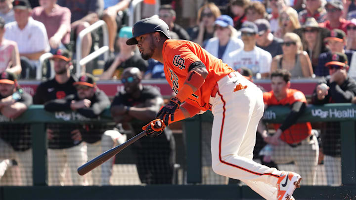 Feb 22, 2026; Scottsdale, Arizona, USA; San Francisco Giants infielder Luis Arraez (1) hits against the Chicago Cubs in the first inning at Scottsdale Stadium. Mandatory Credit: Rick Scuteri-Imagn Images