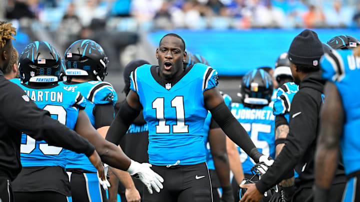 Oct 26, 2025; Charlotte, North Carolina, USA; Carolina Panthers linebacker Nic Scourton (11) runs on to the field before the game at Bank of America Stadium. Mandatory Credit: Bob Donnan-Imagn Images Oct 26, 2025; Charlotte, North Carolina, USA; Carolina Panthers linebacker Nic Scourton (11) runs on to the field before the game at Bank of America Stadium. Mandatory Credit: Bob Donnan-Imagn Images