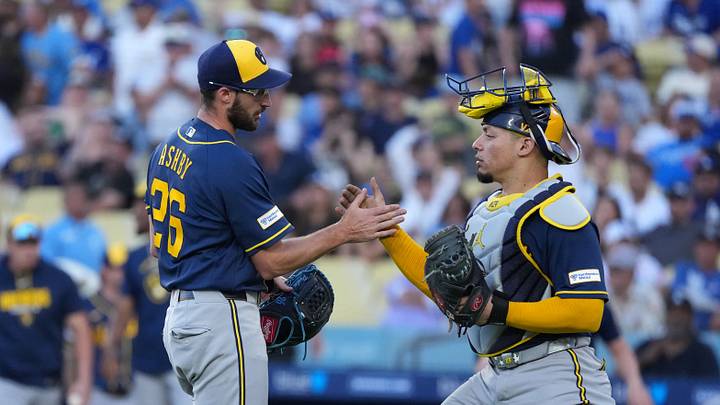 Aug 15, 2026; Los Angeles, California, USA; Milwaukee Brewers pitcher Aaron Ashby (26) and catcher William Contreras (24) react at the end of the game against the Los Angeles Dodgers at Dodger Stadium. Mandatory Credit: Kirby Lee-Imagn Images Aug 15, 2026; Los Angeles, California, USA; Milwaukee Brewers pitcher Aaron Ashby (26) and catcher William Contreras (24) react at the end of the game against the Los Angeles Dodgers at Dodger Stadium. Mandatory Credit: Kirby Lee-Imagn Images