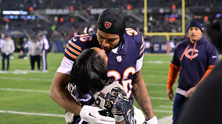 Dec 26, 2024; Chicago, Illinois, USA; United States gymnast Simone Biles greets husband and Chicago Bears defensive back Jonathan Owens (36) before the game against the Seattle Seahawks at Soldier Field. Dec 26, 2024; Chicago, Illinois, USA; United States gymnast Simone Biles greets husband and Chicago Bears defensive back Jonathan Owens (36) before the game against the Seattle Seahawks at Soldier Field.