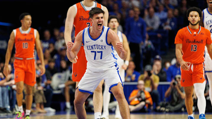 Nov 9, 2024; Lexington, Kentucky, USA; Kentucky Wildcats guard Kerr Kriisa (77) celebrates during the second half against the Bucknell Bison at Rupp Arena at Central Bank Center. Mandatory Credit: Jordan Prather-Imagn Images