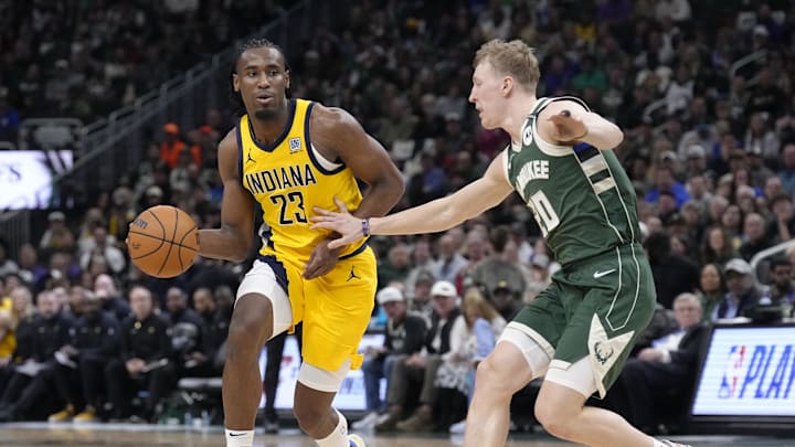 Apr 25, 2025; Milwaukee, Wisconsin, USA; Indiana Pacers forward Aaron Nesmith (23) drives against Milwaukee Bucks guard AJ Green (20) in the first half during game three of first round for the 2024 NBA Playoffs at Fiserv Forum. Mandatory Credit: Michael McLoone-Imagn Images Apr 25, 2025; Milwaukee, Wisconsin, USA; Indiana Pacers forward Aaron Nesmith (23) drives against Milwaukee Bucks guard AJ Green (20) in the first half during game three of first round for the 2024 NBA Playoffs at Fiserv Forum. Mandatory Credit: Michael McLoone-Imagn Images