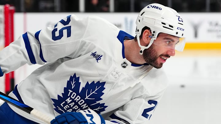 Mar 5, 2025; Las Vegas, Nevada, USA; Toronto Maple Leafs defenseman Conor Timmins (25) warms up before a game against the Vegas Golden Knights at T-Mobile Arena. Mandatory Credit: Stephen R. Sylvanie-Imagn Images
