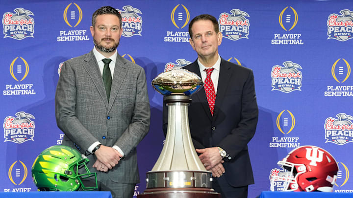 Oregon head coach Dan Lanning and Indiana head coach Curt Cignetti during a Peach Bowl news conference.