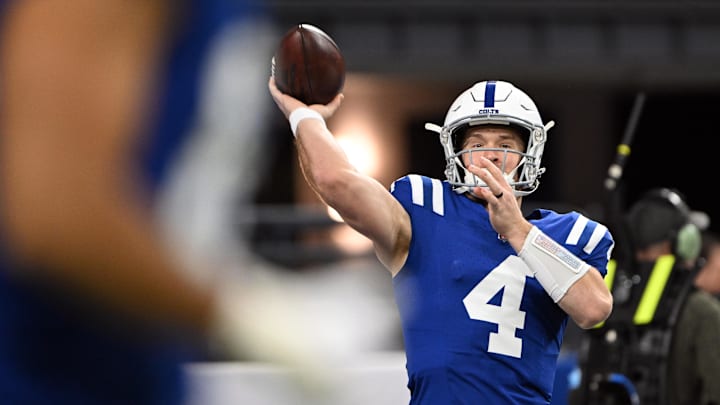 Jan 5, 2025; Indianapolis, Indiana, USA; Indianapolis Colts quarterback Sam Ehlinger (4) throws a pass to warm up before the game against the Jacksonville Jaguars at Lucas Oil Stadium. Mandatory Credit: Marc Lebryk-Imagn Images