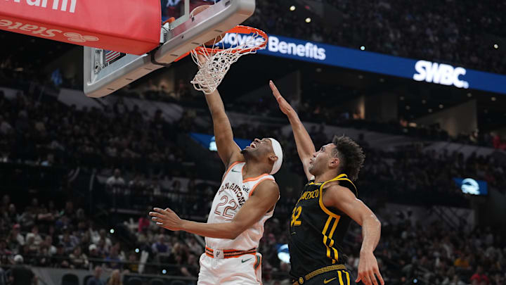 Mar 31, 2024; San Antonio, Texas, USA;  San Antonio Spurs guard Malaki Branham (22) shoots in front