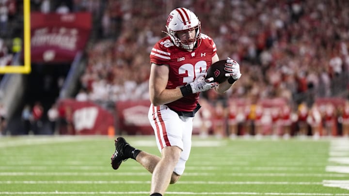 Aug 30, 2024; Madison, Wisconsin, USA;  Wisconsin Badgers tight end Tucker Ashcraft (38) during the game against the Western Michigan Broncos at Camp Randall Stadium.