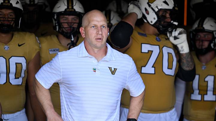 Sep 12, 2026; Nashville, Tennessee, USA; Vanderbilt Commodores head coach Clark Lea leads the team onto the field against the Delaware Blue Hens during the first half at FirstBank Stadium. Mandatory Credit: Steve Roberts-Imagn Images Sep 12, 2026; Nashville, Tennessee, USA; Vanderbilt Commodores head coach Clark Lea leads the team onto the field against the Delaware Blue Hens during the first half at FirstBank Stadium. Mandatory Credit: Steve Roberts-Imagn Images