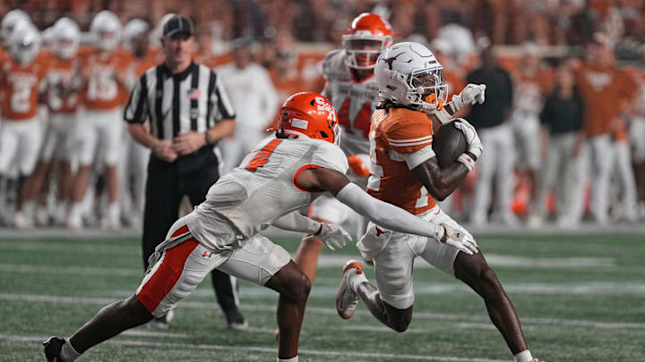 Texas Longhorns wide receiver Aaron Butler runs for yards after making a reception against Sam Houston Texas Longhorns wide receiver Aaron Butler runs for yards after making a reception against Sam Houston