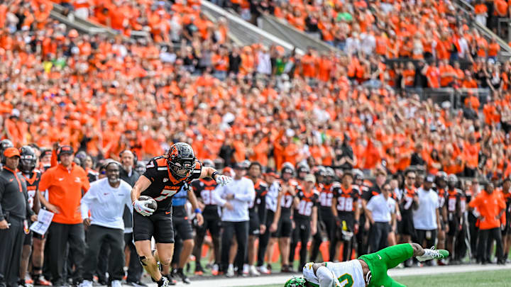 Sep 14, 2024; Corvallis, Oregon, USA; Oregon State Beavers wide receiver Trent Walker (7) catches a pass during the first quarter against the Oregon Ducks at Reser Stadium. Mandatory Credit: Craig Strobeck-Imagn Images
