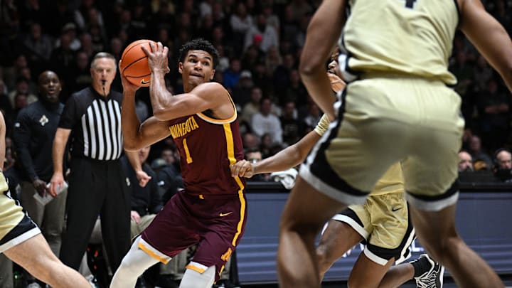 Dec 10, 2025; West Lafayette, Indiana, USA; Minnesota Golden Gophers guard Isaac Asuma (1) jukes in front of multiple Purdue Boilermakers during the first half at Mackey Arena. Mandatory Credit: Marc Lebryk-Imagn Images Dec 10, 2025; West Lafayette, Indiana, USA; Minnesota Golden Gophers guard Isaac Asuma (1) jukes in front of multiple Purdue Boilermakers during the first half at Mackey Arena. Mandatory Credit: Marc Lebryk-Imagn Images