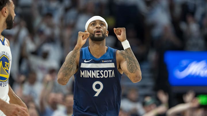 May 8, 2025; Minneapolis, Minnesota, USA; Minnesota Timberwolves guard Nickeil Alexander-Walker (9) celebrates after making a three point shot against the Golden State Warriors in the second half during game two of the second round for the 2025 NBA Playoffs at Target Center. Mandatory Credit: Jesse Johnson-Imagn Images